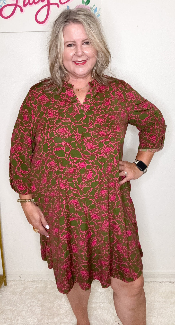 Woman wearing a floral dress with a white background