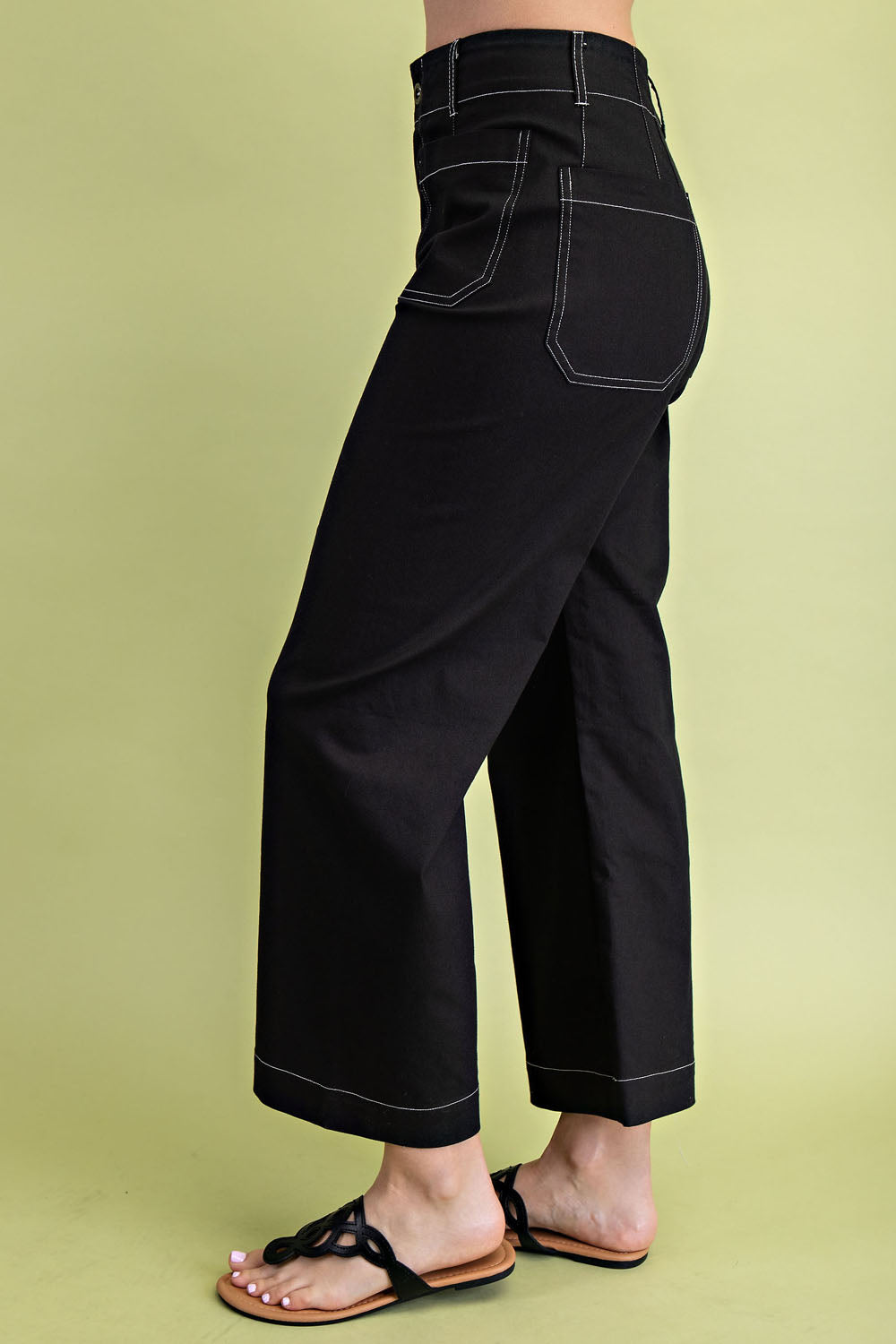 black pants with white stitching