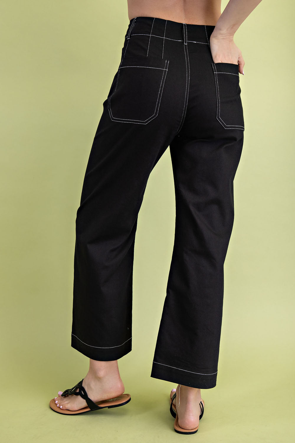 black pants with white stitching back view