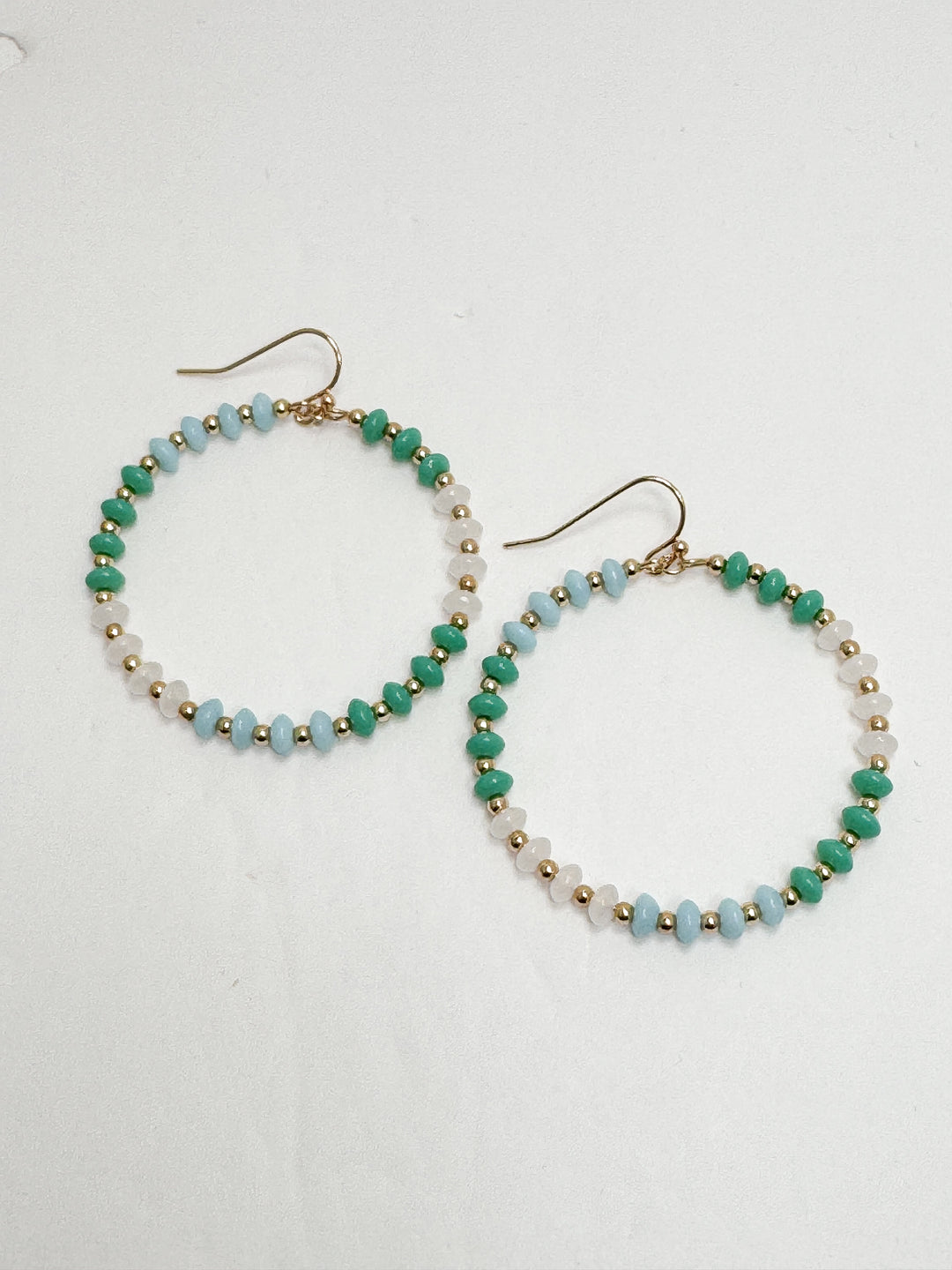 blue green beaded rounded earrings