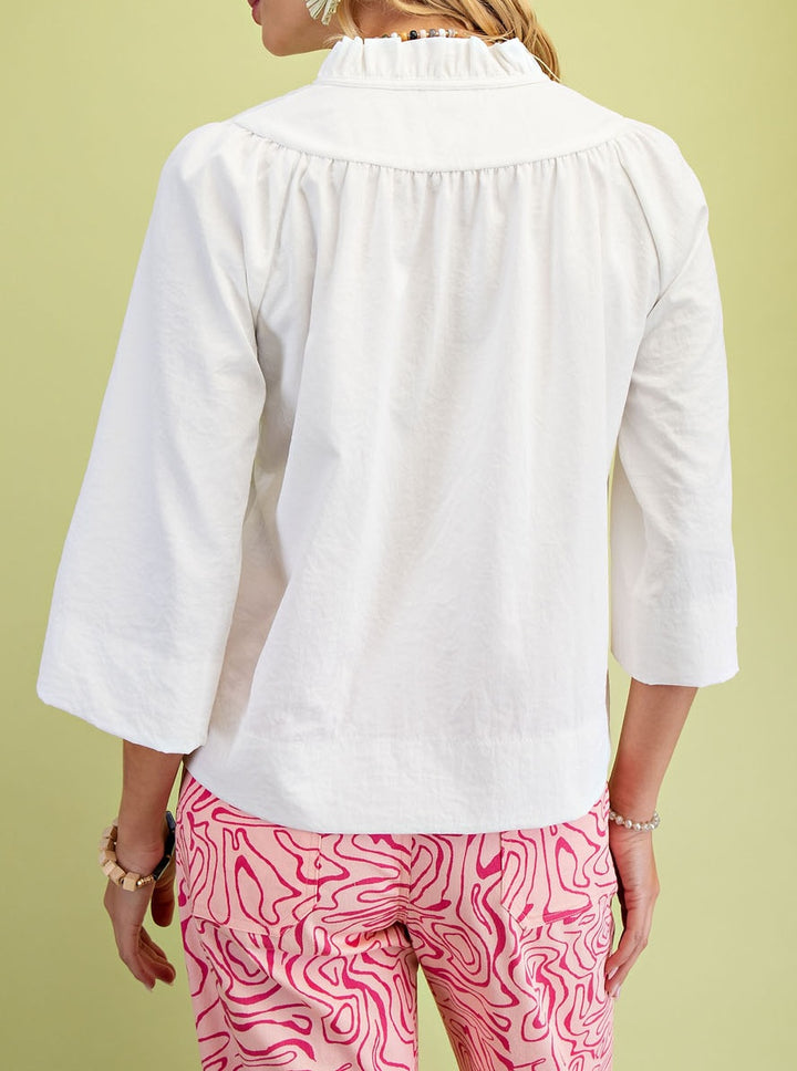 back of white crisp top