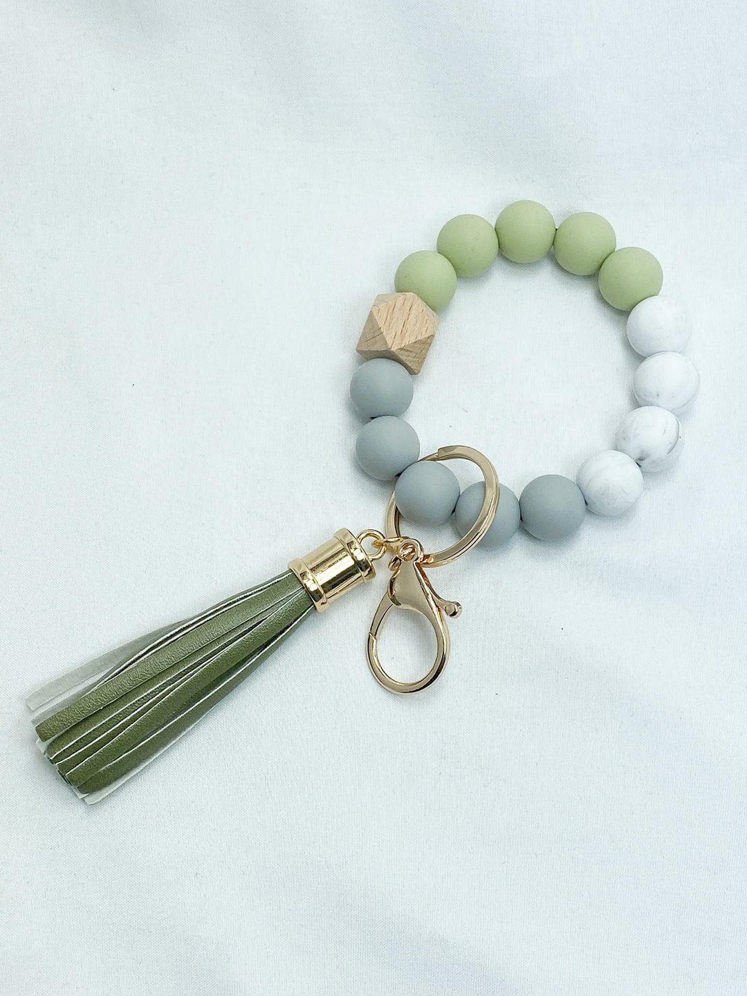 Round Keychain w/ Tassel