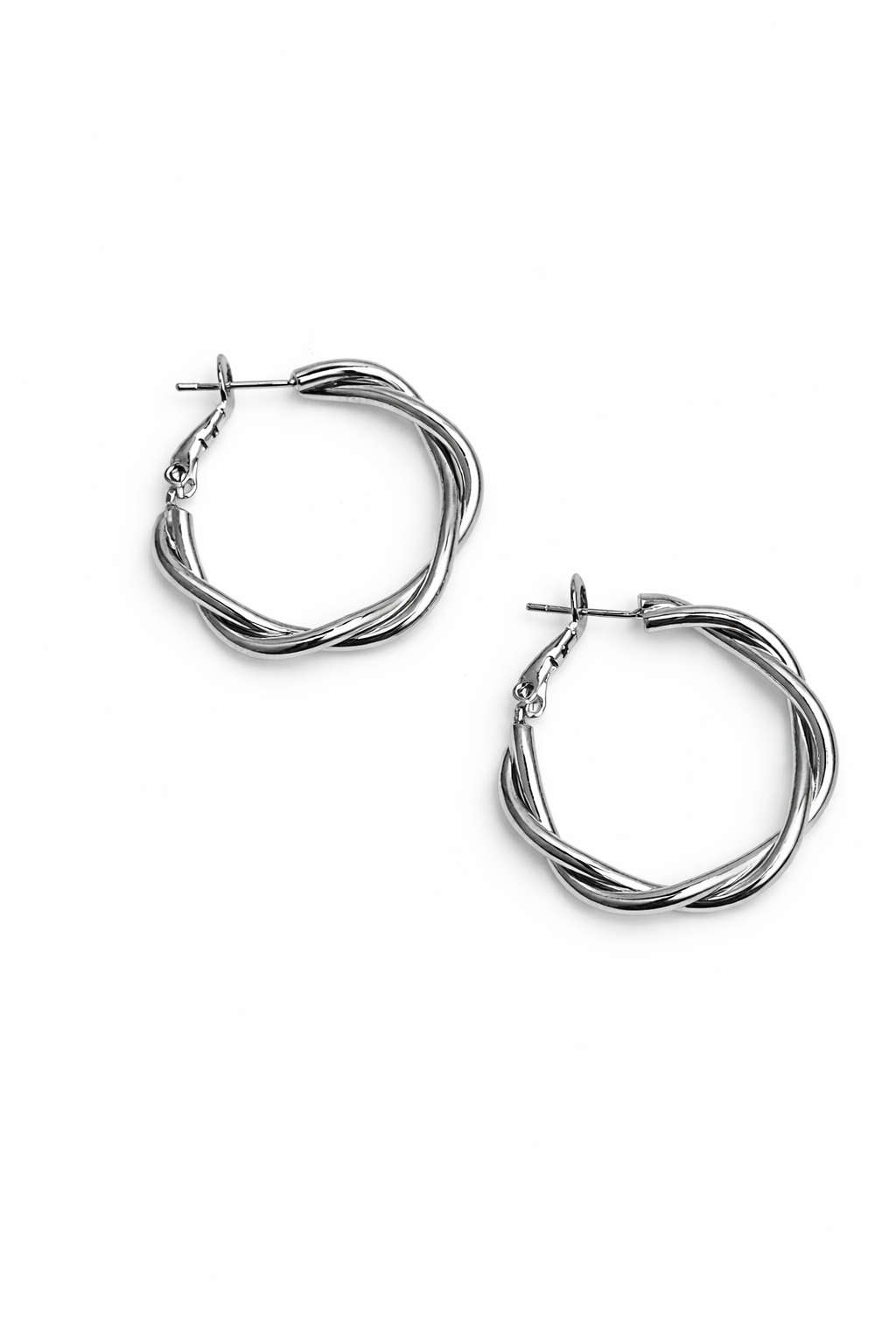 Pair of silver hoop earrings on a white background