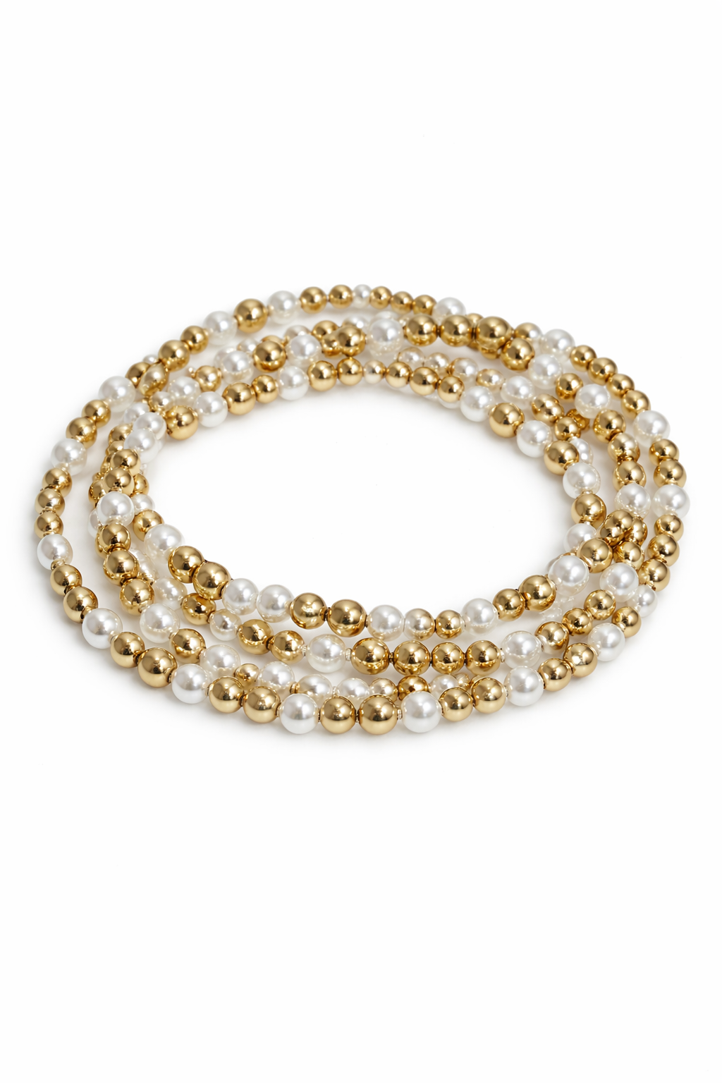 Multi-strand pearl and gold bead bracelet on a white background