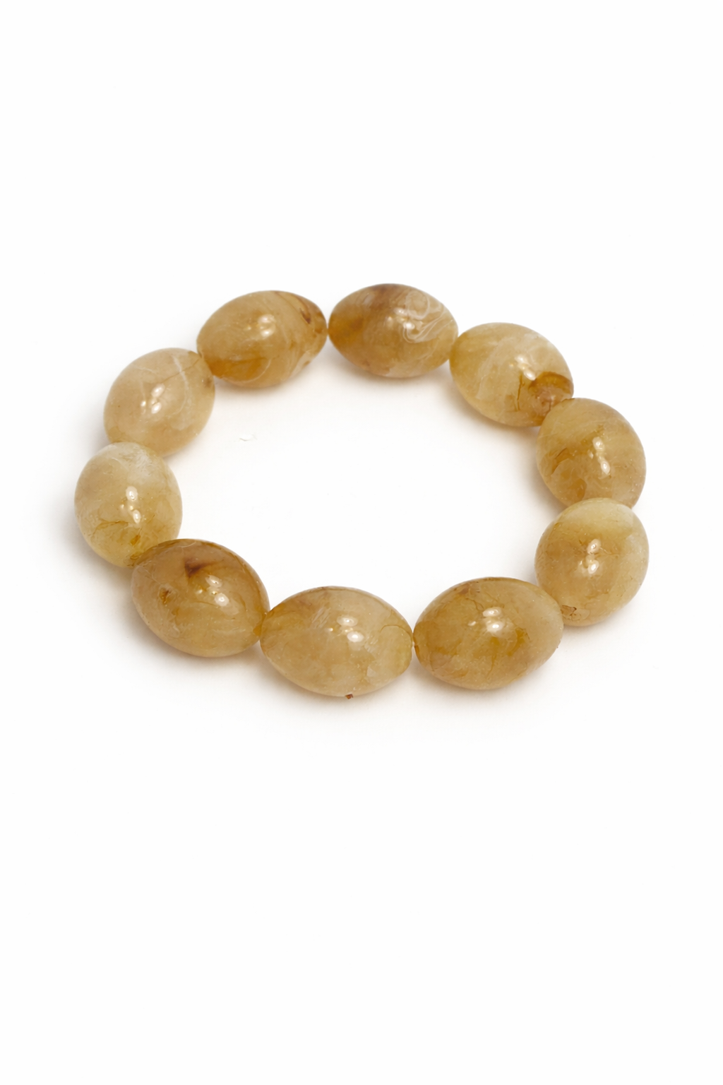Beige beaded bracelet on a white background