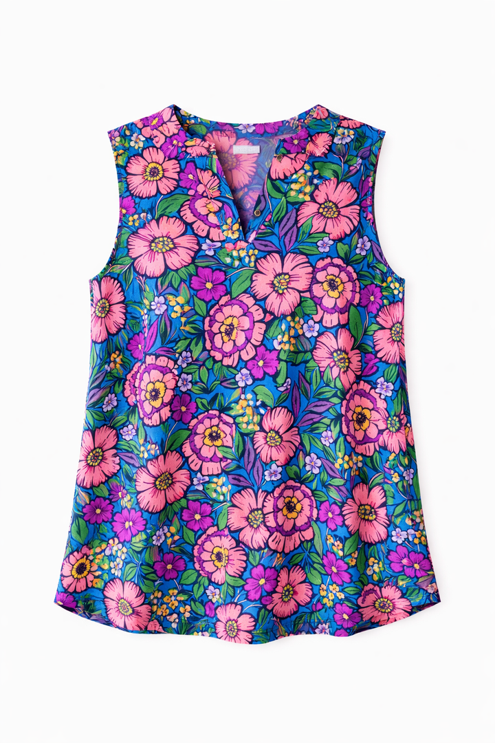 Colorful floral sleeveless top on a white background