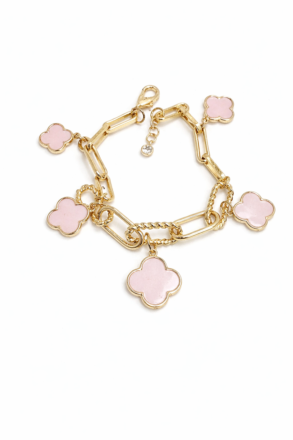 Gold bracelet with pink clover-shaped charms on a white background