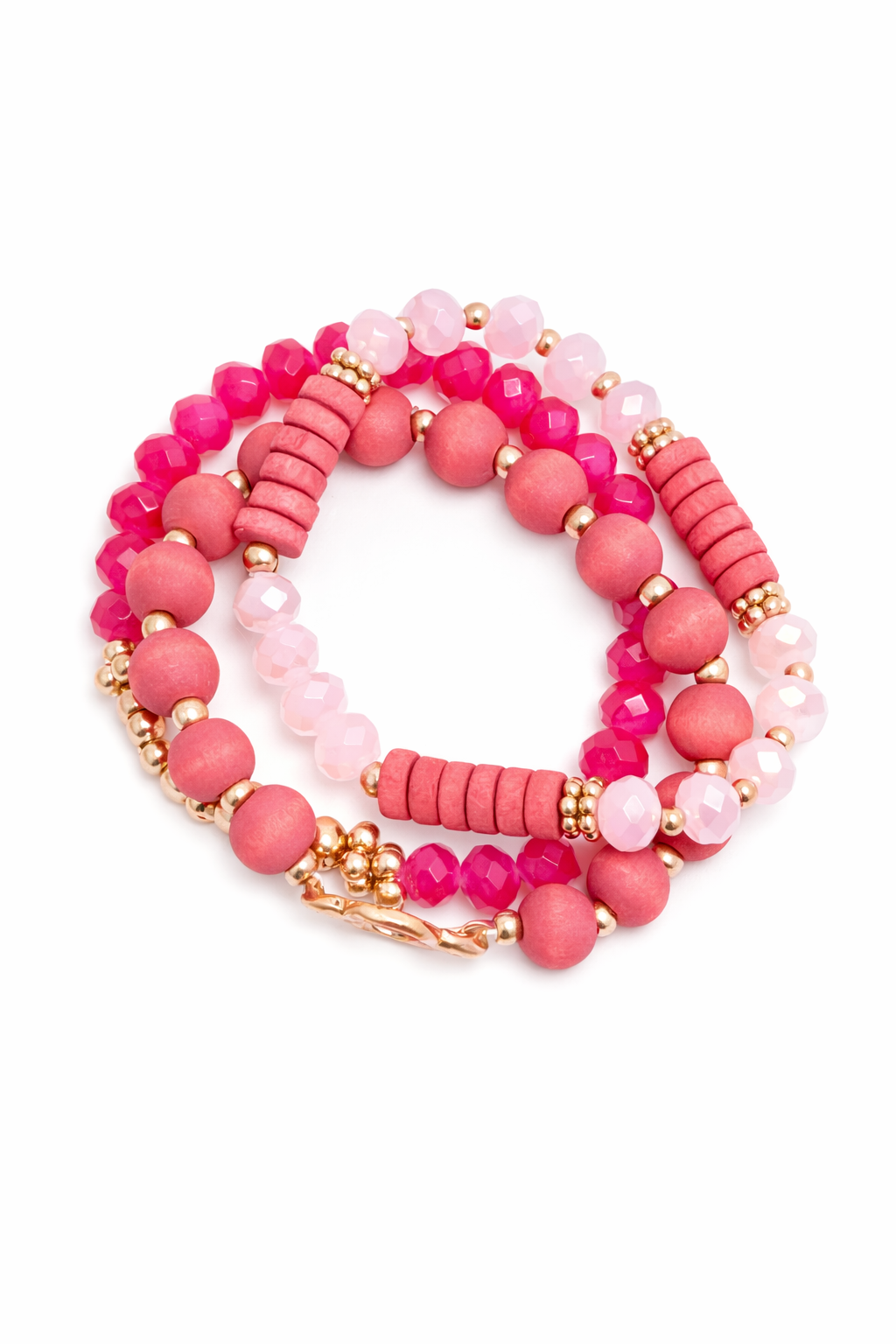 Set of pink beaded bracelets with gold accents on a white background