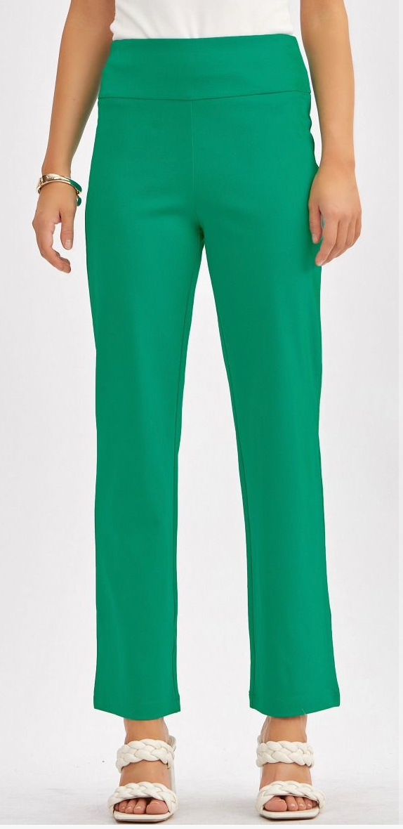 Green pants worn by a person on a white background