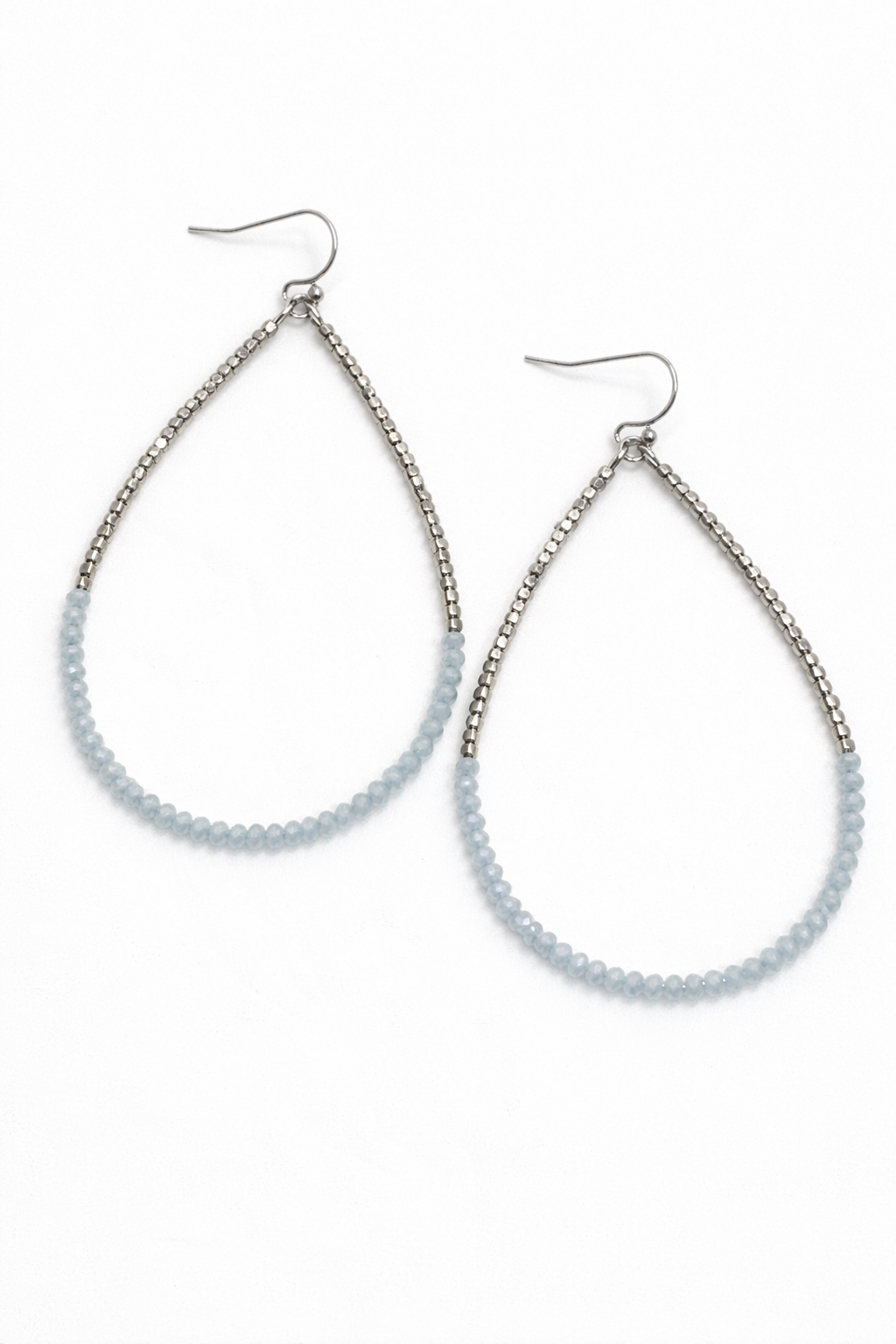 Teardrop-shaped earrings with light blue beads on a white background