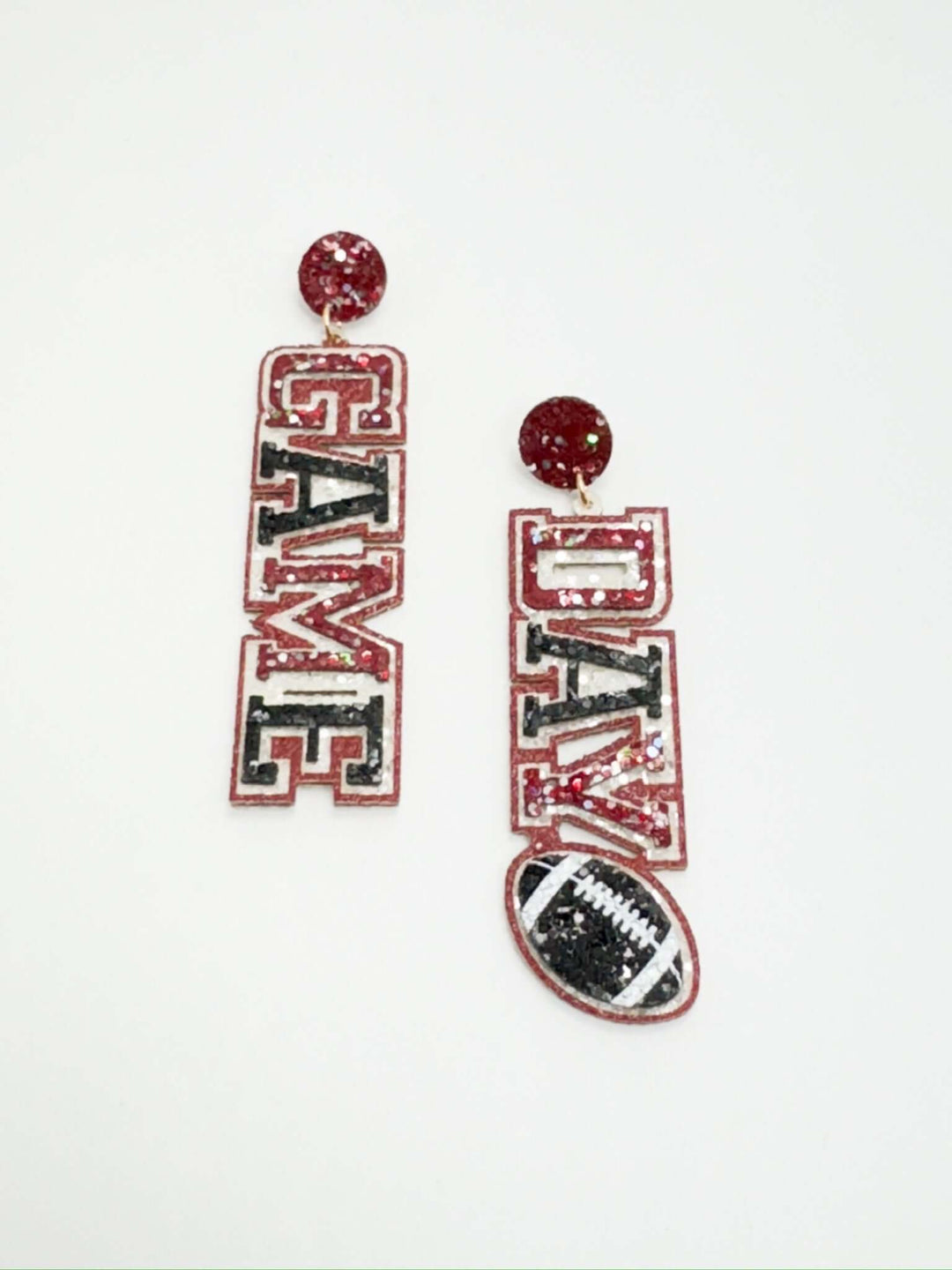 A pair of maroon, black, and white beaded earrings with the text 'Game Day' displayed prominently.