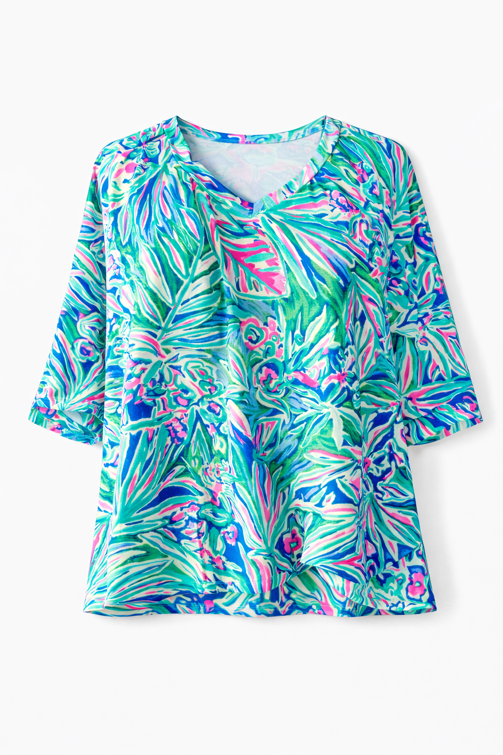 Colorful tropical print shirt on a white background