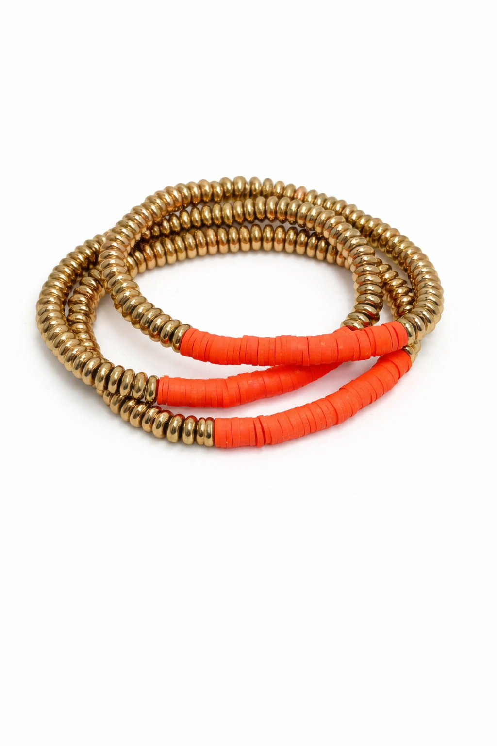 Two bracelets, one gold and one orange, on a white background