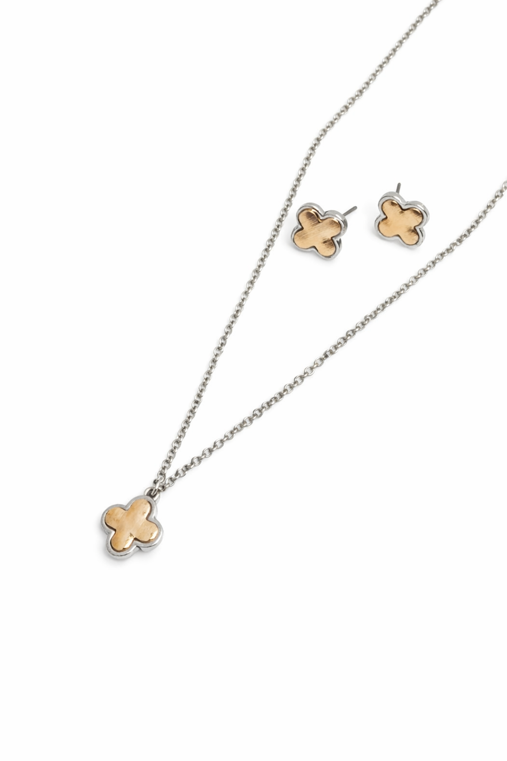 Jewelry set with floral pendant necklace and earrings on a white background